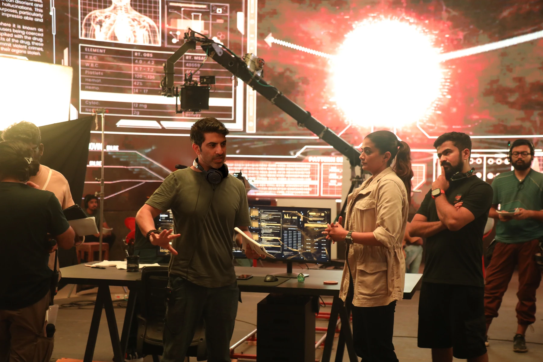 Rajeev Dassani working with cast and crew on set